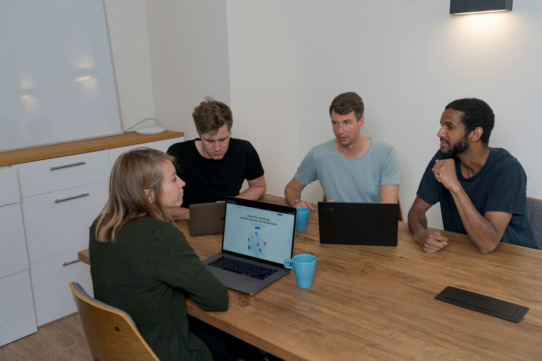corporate programmers discussing