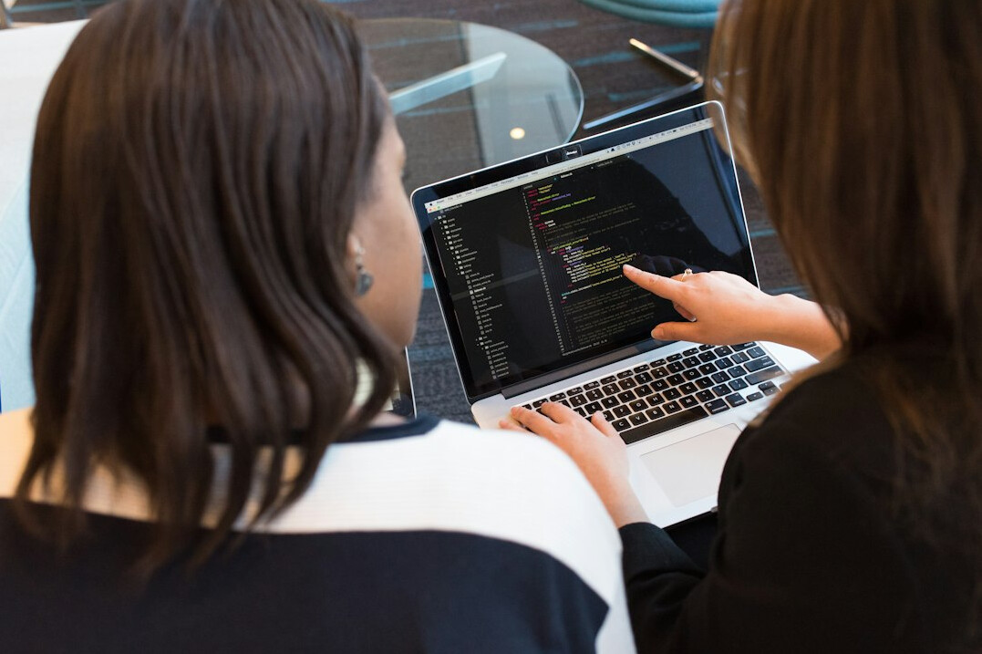 software developers coding together