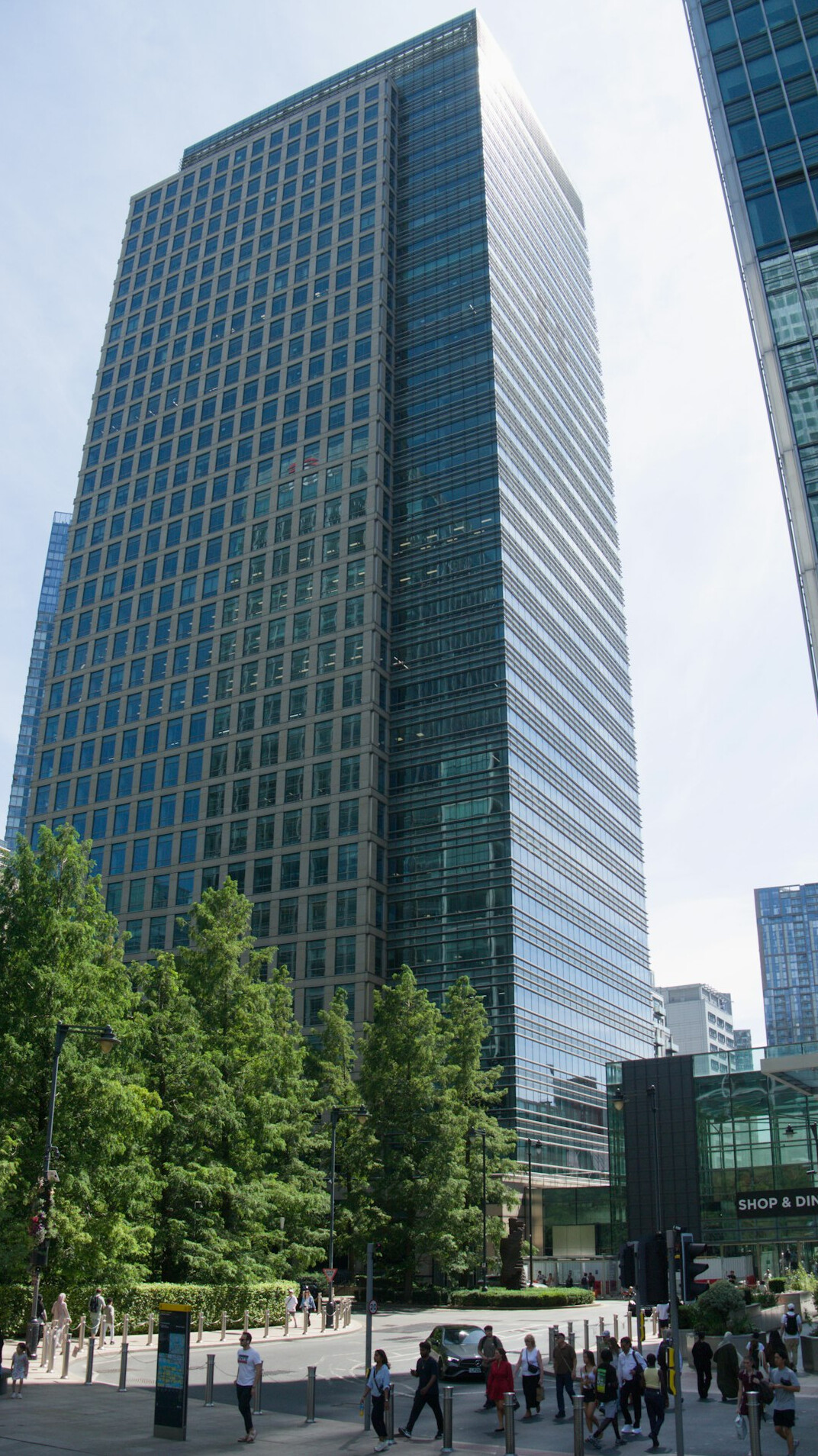 Modern bright office interior with large windows and desks