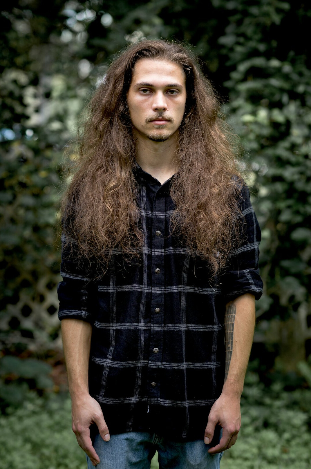 Portrait of a bearded man in a casual shirt